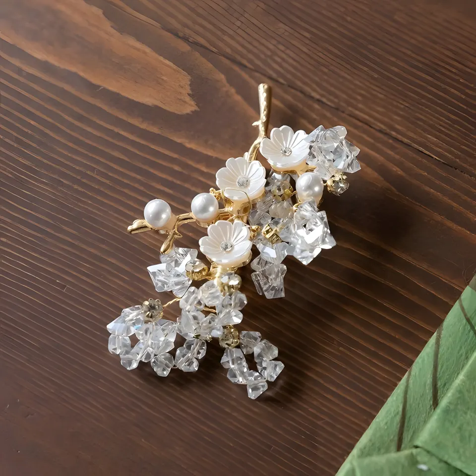 The Crystal Cherry Blossom Brooch, accessory from the collection, product photograph