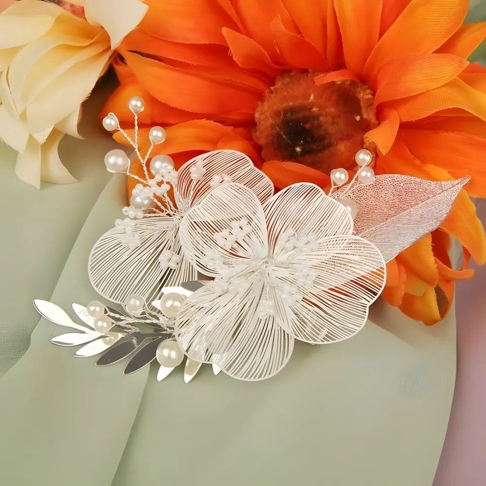 The White Flower Silver Clip, hair accessory from the collection, product photograph
